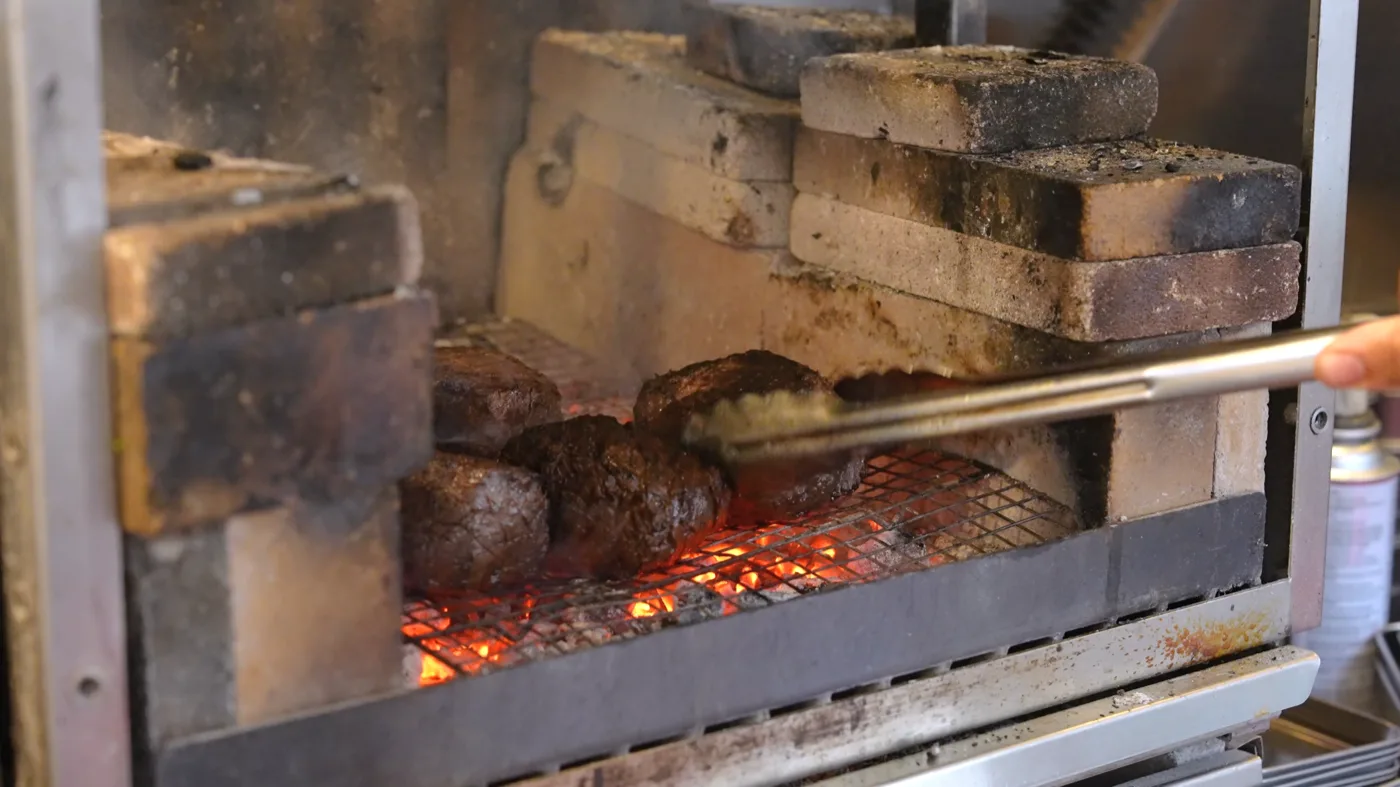 Live-fire cooking and food preparation at The Inn at Newport Ranch