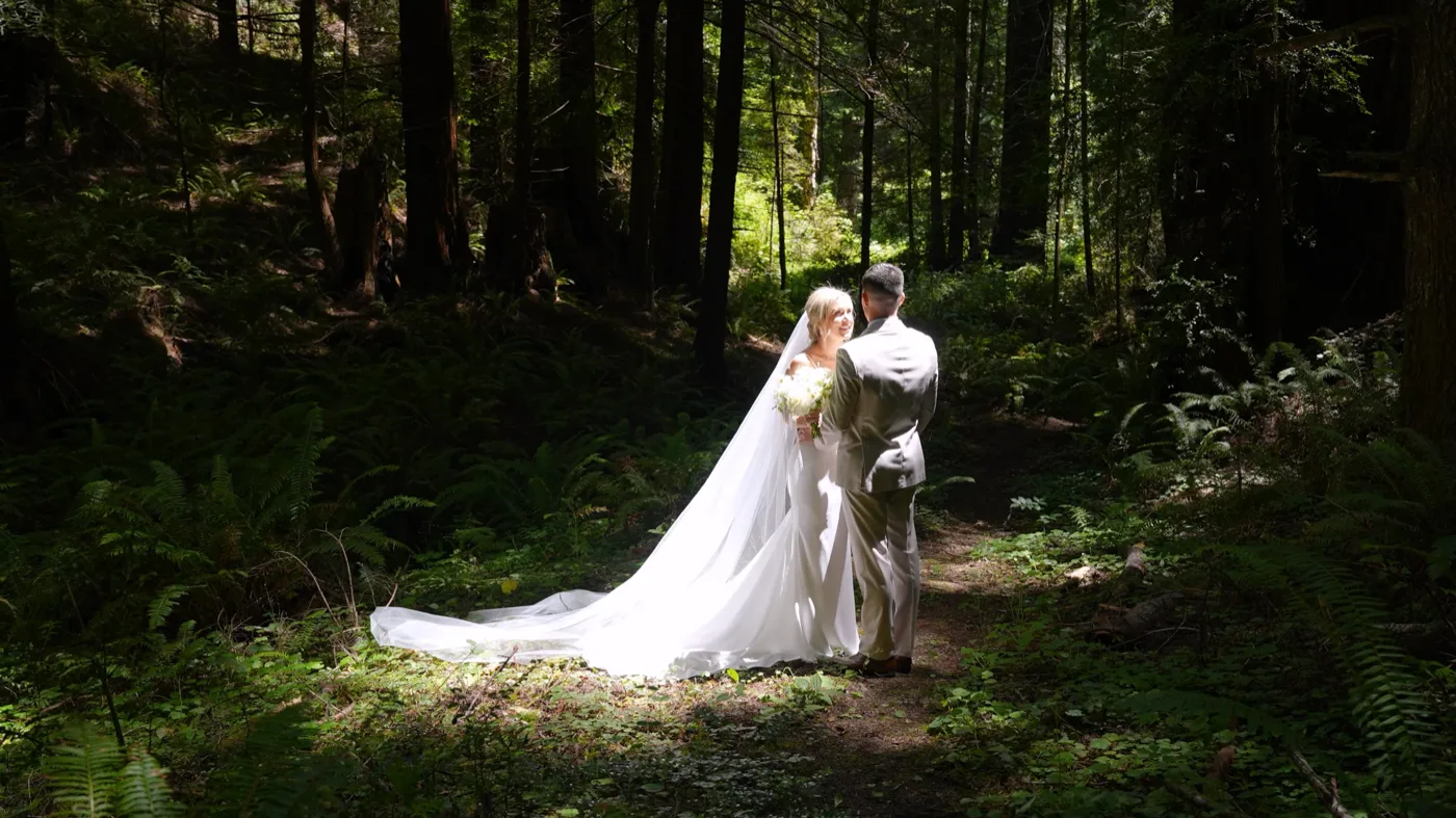 Jessica and Ryan beneath the coastal redwoods at The Inn at Newport Ranch